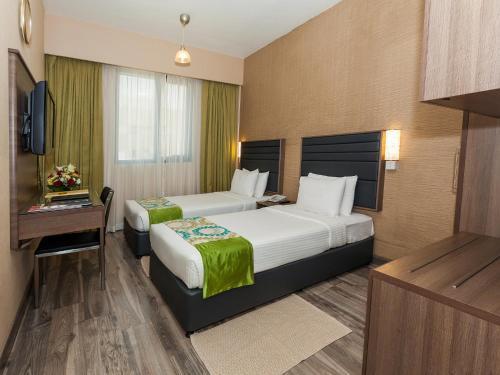 Oasis Deira Hotel Dubai Exterior foto